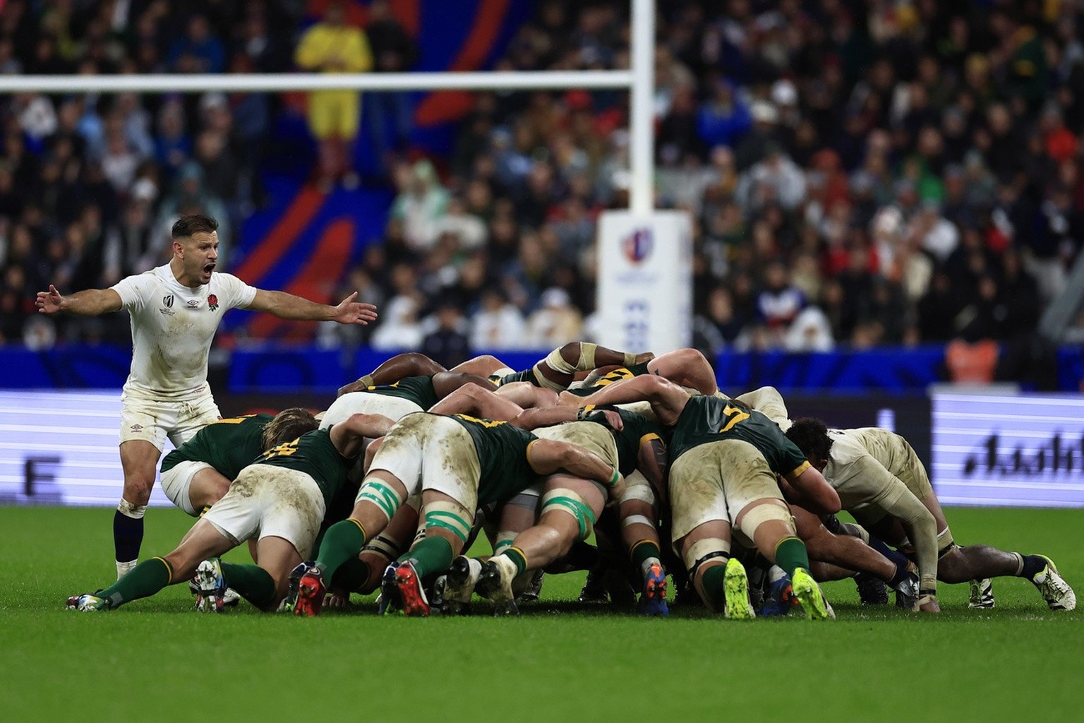 Players contest a scrum during the Rugby World Cup semifinal match between England and South Africa at the Stade de France in Saint-Denis, near Paris, Saturday, Oct. 21, 2023. (AP Photo/Aurelien Moris ...