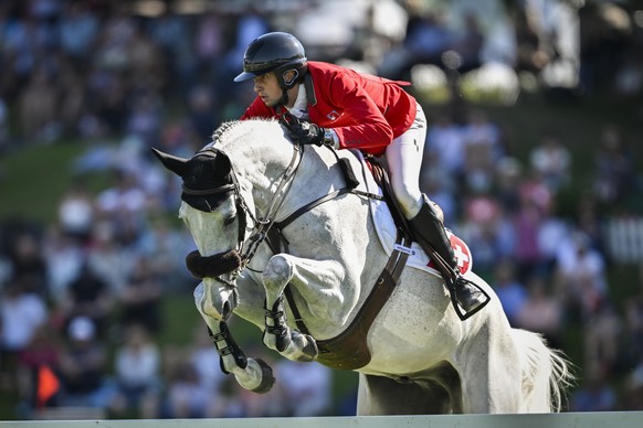 Martin Fuchs of Switzerland on Leone Lei at the &quot;Longines Grand Prix der Schweiz&quot;, a competition with price money of 250&#039;000 Euro, at the CSIO Show horse jumping, on Friday, June 2, 202 ...