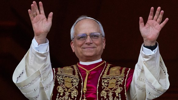 Newly elected Pope Leo XIV appears at the balcony of St. Peter's Basilica at the Vatican, Thursday, May 8, 2025. (AP Photo/Andrew Medichini)
Leo XIV