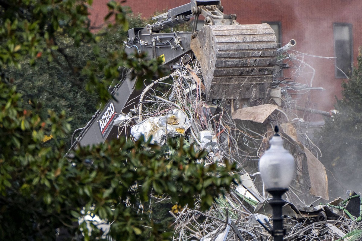 An excavator clears the rubble from the demolition of the East Room at The White House in Washington, DC on Friday, October 24, 2025. The demolition is part of President Donald Trump s plan to build a ...