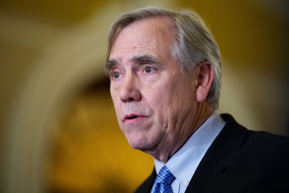 epa12536754 Senator Jeff Merkley (D-OR) during a press conference outside the Senate Chamber of the Capitol Building in Washington, District of Columbia, USA, 19 November 2025. The Senate unanimously  ...