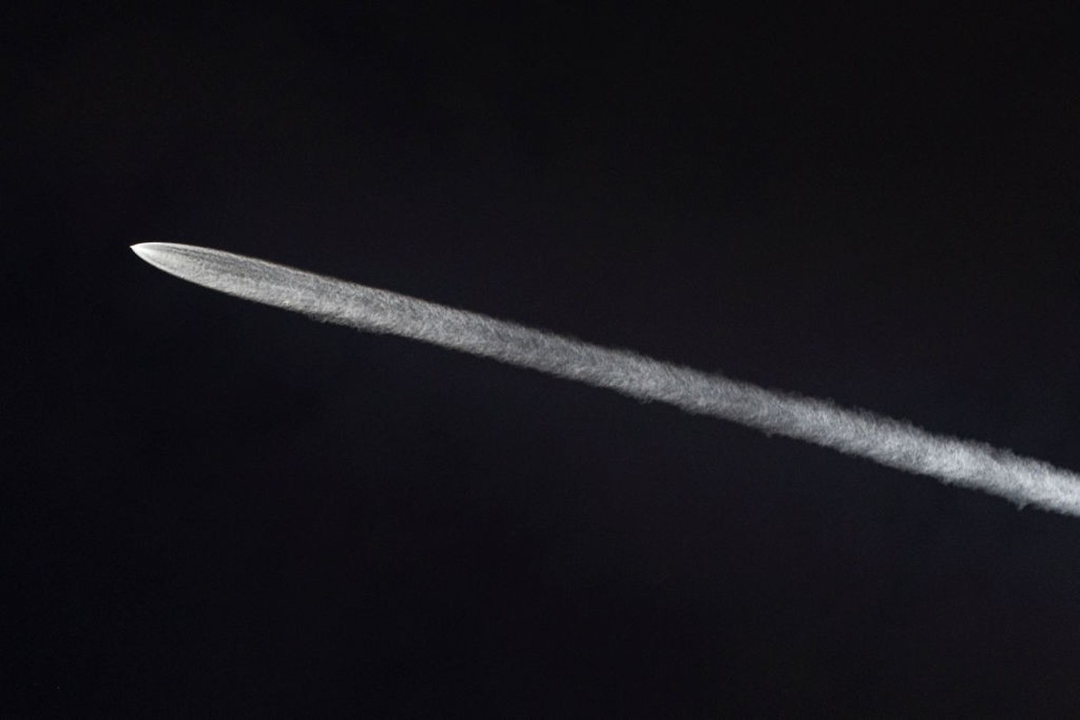 SAN DIEGO, CALIFORNIA - FEBRUARY 10: A SpaceX Falcon 9 rocket carrying a payload of 23 Starlink internet satellites soars into space after sunset after launching from Vandenberg Space Force Base on Fe ...