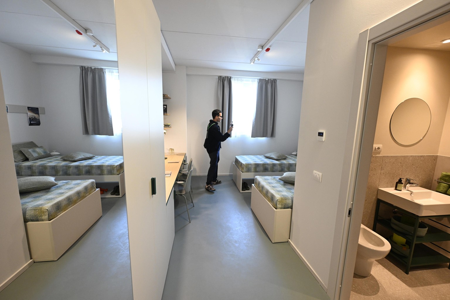 epa12417146 View of a twin room during the presentation of the Olympic and Paralympic Village for the Milan-Cortina 2026 Winter Games at Scalo Romana in Milan, Italy, 30 September 2025. EPA/DANIEL DAL ...