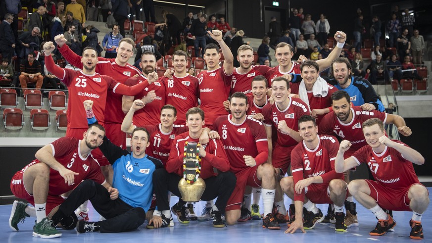 The Swiss team celebrates after the Yellow Cup Handball game between Switzerland and Netherlands in Switzerland, Winterthur, Sunday 05 January 2020. (KEYSTONE/Ennio Leanza)