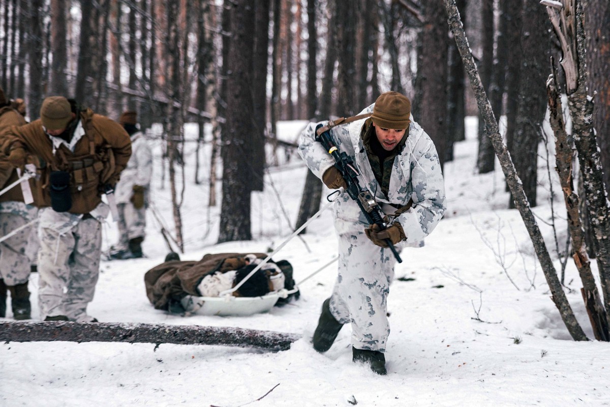 February 14, 2025 - Setemoen, Norway - A U.S. Marine with Combat Logistics Battalion 2, Combat Logistics Regiment 2, 2nd Marine Logistics Group pulls a sled with a simulated casualty during cold weath ...