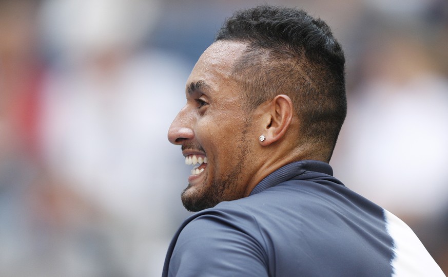 epa06991260 Nick Kyrgios of Australia reacts as he plays Roger Federer of Switzerland during the sixth day of the US Open Tennis Championships the USTA National Tennis Center in Flushing Meadows, New  ...