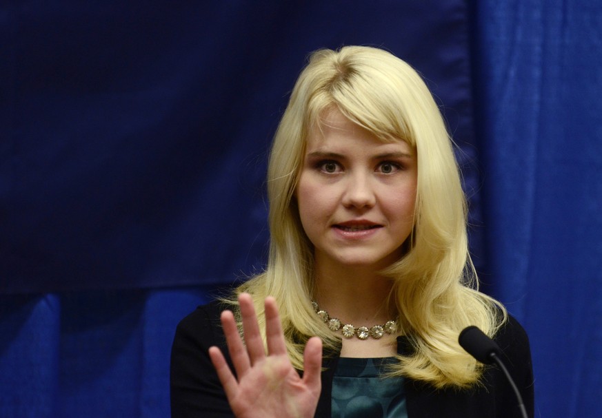 FILE - This is a Tuesday, Oct. 30, 2012 file photo of Elizabeth Smart as she speaks to reporters regarding her advocacy of child protection and the healing process she has experienced, prior to her pr ...