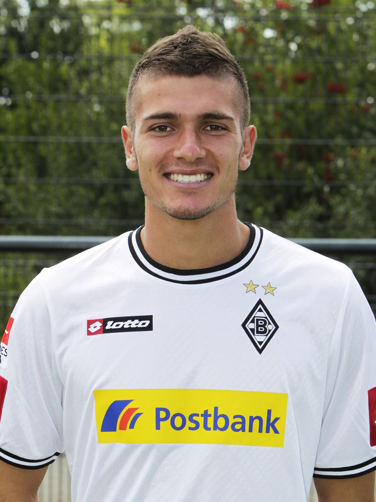 In this picture taken July 7, 2011 Moenchengladbach's soccer player Roman Neustaedter poses during a photo call in Moenchengladbach Germany. Schalke says Tuesday jJan. 10, 2012 it has signed tale ...
