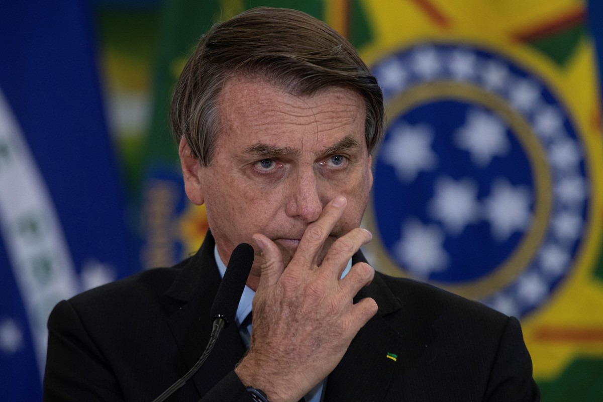 epa09097687 Brazil's president Jair Bolsonaro participates in the announcement of CAIXA's new measures to support Santas Casas and Hospitales Filantropicos, at the Palacio do Planalto in the ...