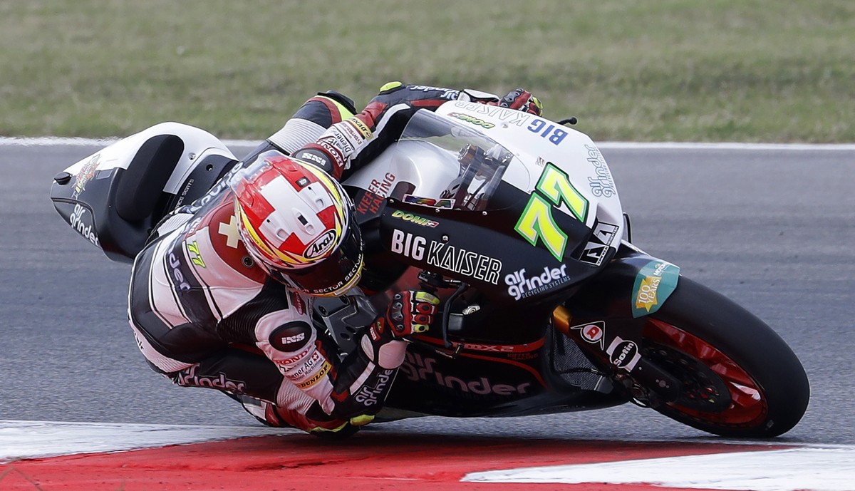 Switzerland's Dominique Aegerter rides his Suter during the qualifying session for Sunday's San Marino Moto2 race, at the Misano circuit, in Misano Adriatico, Italy, Saturday, Sept. 9, 2017. ...