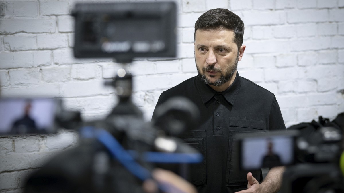 epa12261862 A handout picture made available by the Presidential Press Service shows Ukraine?s President Volodymyr Zelensky visiting a facility where interceptor drones are produced at an undisclosed  ...