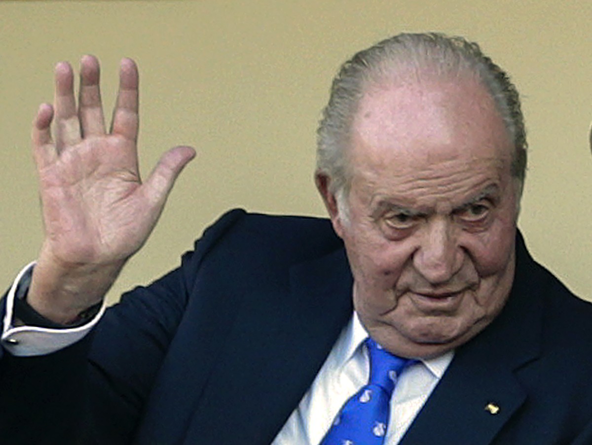FILE - In this file photo dated Sunday, June 2, 2019, Spain's former King Juan Carlos waves at the bullring in Aranjuez, Spain. The royal family