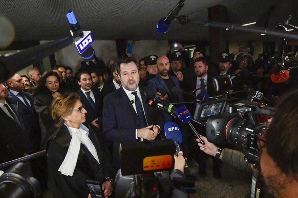 Italy&#039;s vice Premier Matteo Salvini, flanked by his lawyer Giulia Bongiorno, left, speaks to journalists as he leaves a Palermo&#039;s law court in Sicily, Italy, Friday, Dec. 20, 2024, after he  ...