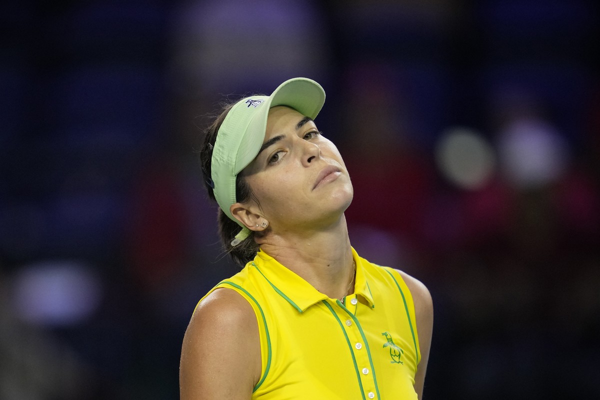 Australia's Ajla Tomljanovic reacts during her final match of the Billie Jean King Cup tennis finals against Switzerland's Belinda Bencic, at the Emirates Arena in Glasgow, Scotland, Sunday, ...