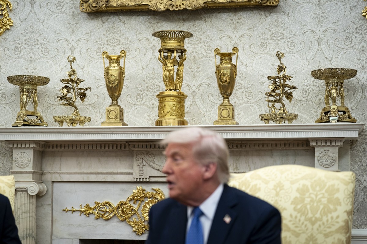 Gold decor on the mantle behind US President Donald Trump, during a meeting with Jonas Gahr Store, Norway's prime minister, not pictured, in the Oval Office of the White House in Washington, DC,  ...