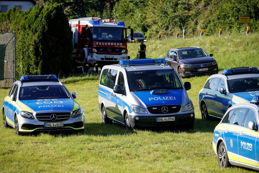 epa08542077 German police is searching for a man armed with knives and pistols in a forest area north of Oppenau near Offenburg, Germany, 12 July 2020. According to the police, the suspect, who disarm ...