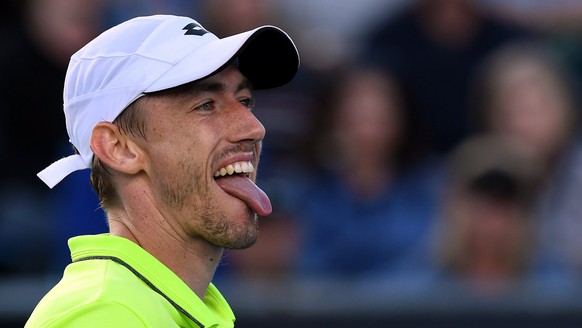 epa06439966 John Millman of Australia reacts against Borna Coric of Croatia during round one of the Australian Open tennis tournament in Melbourne, Australia, 15 January 2018. EPA/LUKAS COCH AUSTRALIA ...