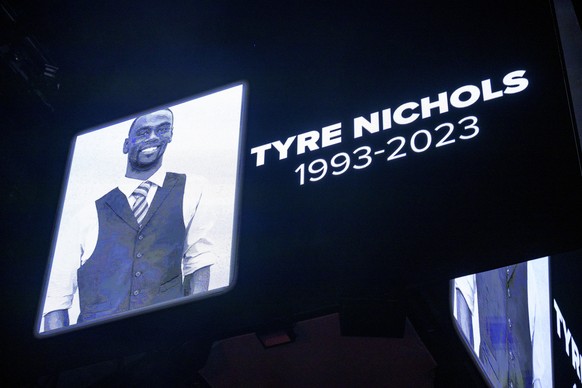 FILE - The screen at the Smoothie King Center honors Tire Nichols for an NBA basketball game between the New Orleans Pelicans and the Washington Wizards in New Orleans, Saturday, January 28, 2023. Nic…