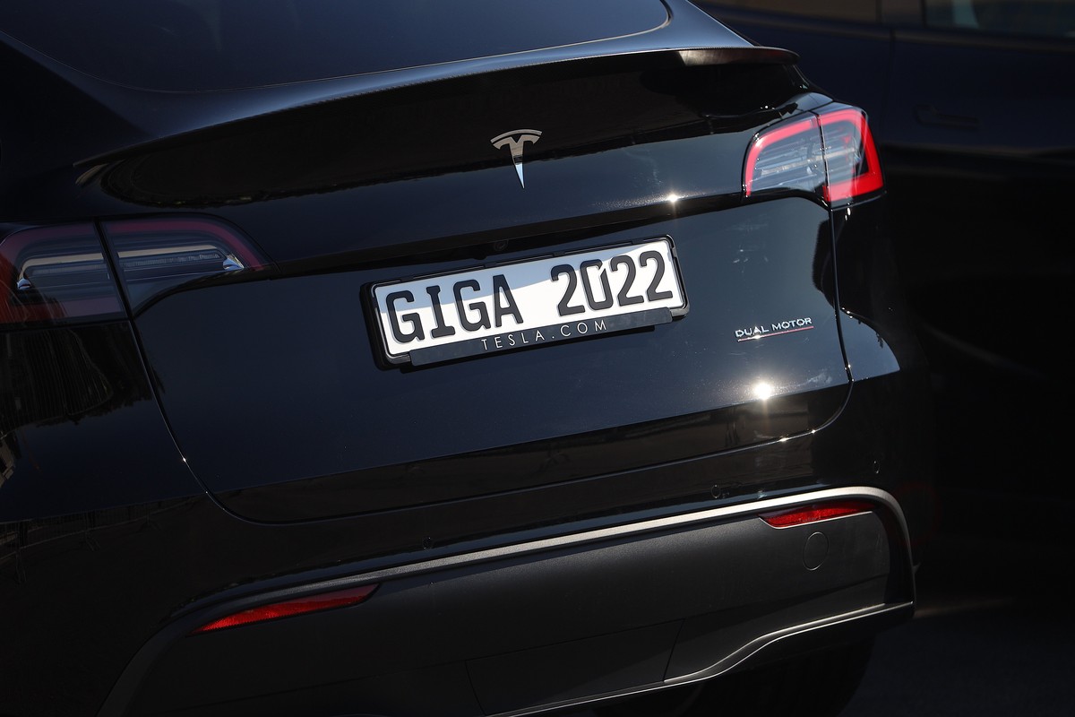 epa09842020 A Tesla vehicle is on display during the opening day of the Tesla 'Gigafactory' in Gruenheide near Berlin, Germany, 22 March 2022. German Chancellor Olaf Scholz is also expected  ...
