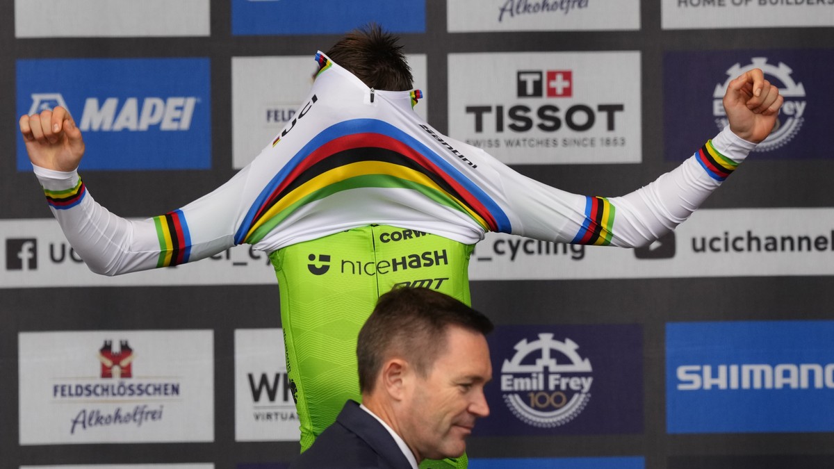 Slovenia's Tadej Pogacar wears the World Champion's rainbow jersey after winning the Men Elite road race of the Cycling and Para-cycling Road World Championships in Zurich, Switzerland, Sund ...