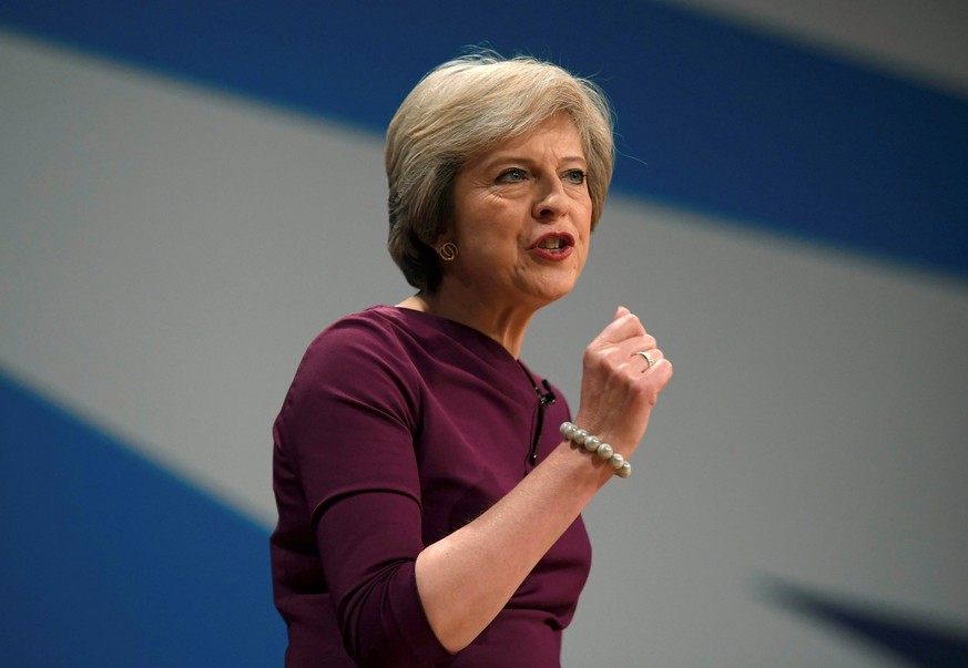 Britain&#039;s Prime Minister Theresa May gives her speech on the final day of the annual Conservative Party Conference in Birmingham, Britain, October 5, 2016. REUTERS/Toby Melville/File Photo