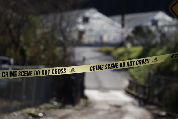 epa10427264 Crime scene tape at the mushroom farm and nursery at one of two scenes of mass shooting in Half Moon Bay, California, U.S., January 24, 2023. The suspected gunman who turned himself in to p...