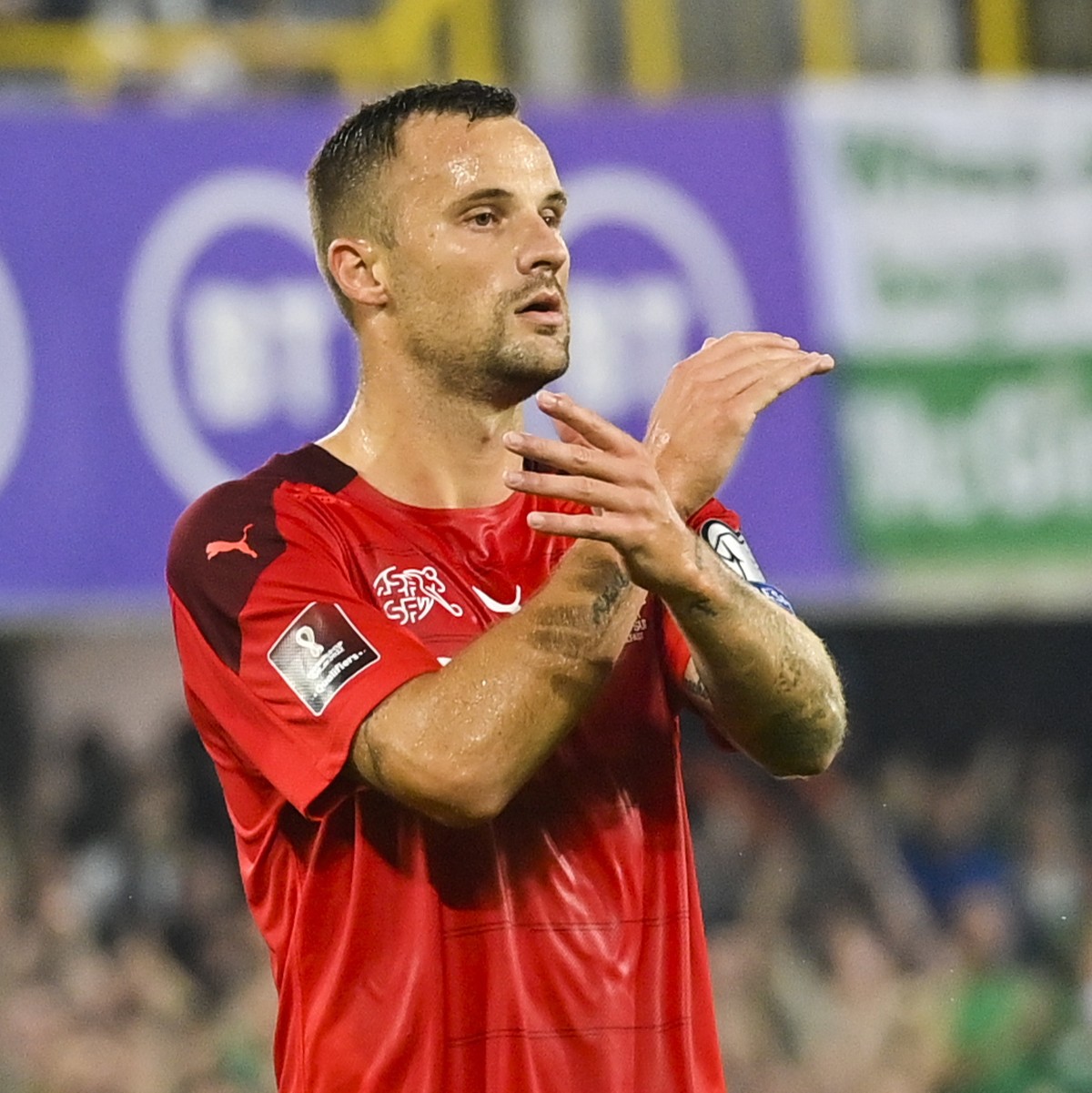 epa09456297 Switzerland's Haris Seferovic reacts after missing a penalty during the FIFA World Cup 2022 group C qualifying soccer match between Northern Ireland and Switzerland at Windsor Park st ...
