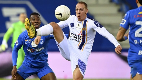 GENK, BELGIUM - DECEMBER 27 : Michael Frey forward of Beveren &amp; Carlos Cuesta defender of Genk during the Jupiler Pro League match between KRC Genk and Waasland Beveren on December 27, 2020 in Gen ...