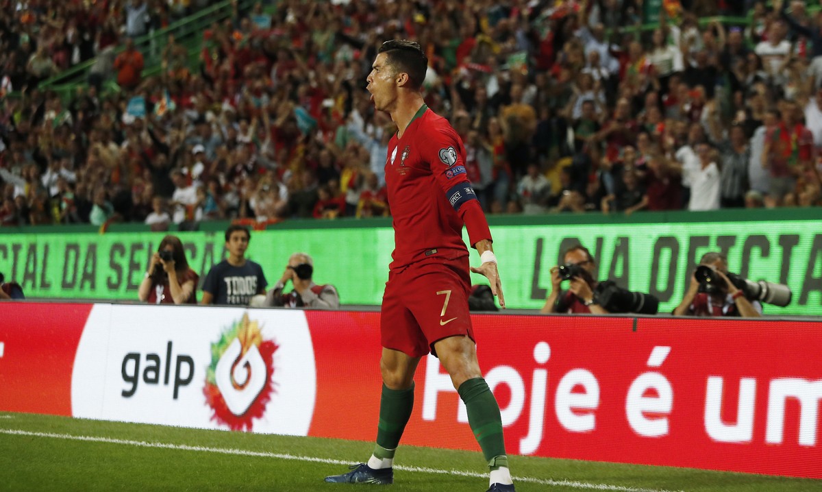 Portugal's Cristiano Ronaldo celebrates after scoring his side's second goal during the Euro 2020 group B qualifying soccer match between Portugal and Luxembourg at the Jose Alvalade stadium ...