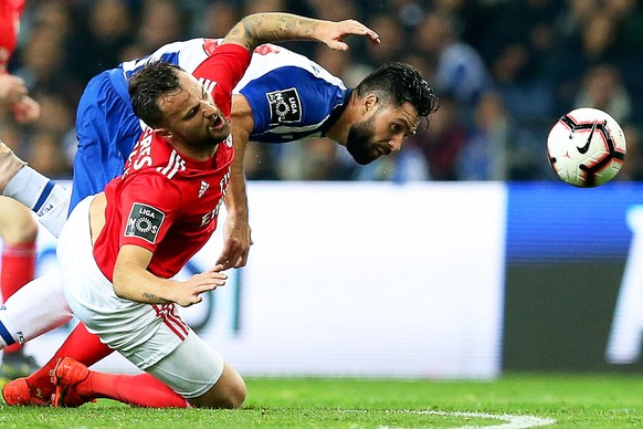epa07409860 FC Porto&#039;s Felipe (R) in action against Benfica&#039;s Haris Seferovic (L) during the Portuguese First League soccer match between FC Porto and Benfica Lisbon in Porto, Portugal, 02 M ...