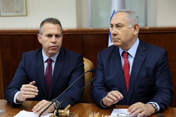 epa05252412 Israeli Prime Minister Benjamin Netanyahu (R) sits next to Israeli Public security Minister Gilad Erdan during the weekly cabinet meeting at his Jerusalem&#039;s office, 10 April 2016. EPA ...