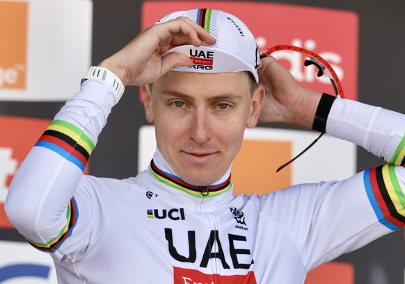 epaselect epa12915292 First placed Slovenian rider Tadej Pogacar of team UAE Team Emirates XRG poses on the podium after the Liege Bastogne Liege one-day cycling race over 259.5km from Liege to Liege, ...