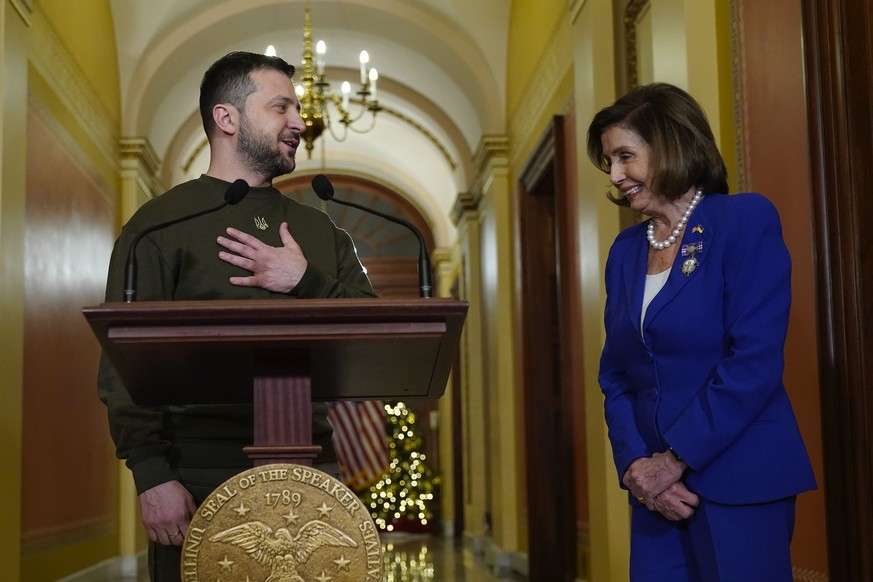 Ukrainian President Volodymyr Zelenskyy, left, meets Speaker of the House Nancy Pelosi, of California, right, Wednesday, Dec. 12.  21, 2022, at the Capitol in Washington.  (AP Photo/Jacquelyn Martin) Volod...