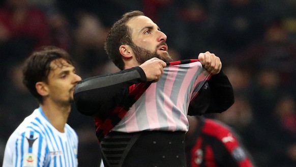 epa07253453 Milan&#039;s Gonzalo Higuain reacts during the Italian Serie A soccer match AC Milan vs S.P.A.L. at the Giuseppe Meazza stadium in Milan, Italy, 29 December 2018. EPA/MATTEO BAZZI