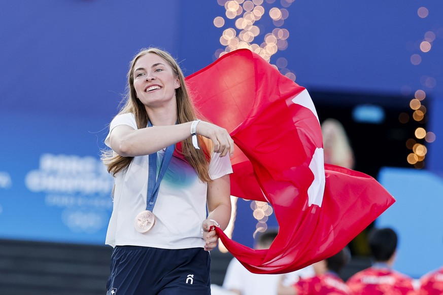 Zoe Claessens (SUI), Bronze medalist in the Women?s Cycling BMX Racing, is pictured during the Champions Parade at the 2024 Paris Summer Olympics at Champions Park (Trocadero), in Paris, France, Monda ...