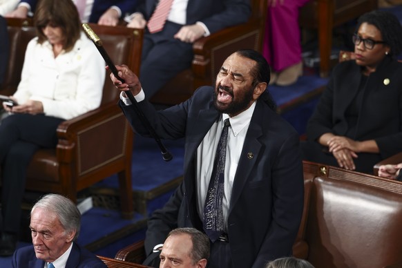 epaselect epa11941194 Democratic Congressman Al Green of Texas interrupts US President Donald Trump's address a joint session of the United States Congress at the US Capitol in Washington, DC, US ...