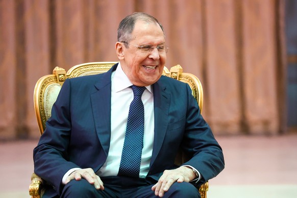 epa10091284 A handout photo made available by the press service of the Russian Foreign Affairs Ministry shows Russian Foreign Minister Sergei Lavrov reacting during a meeting with Congolese President  ...