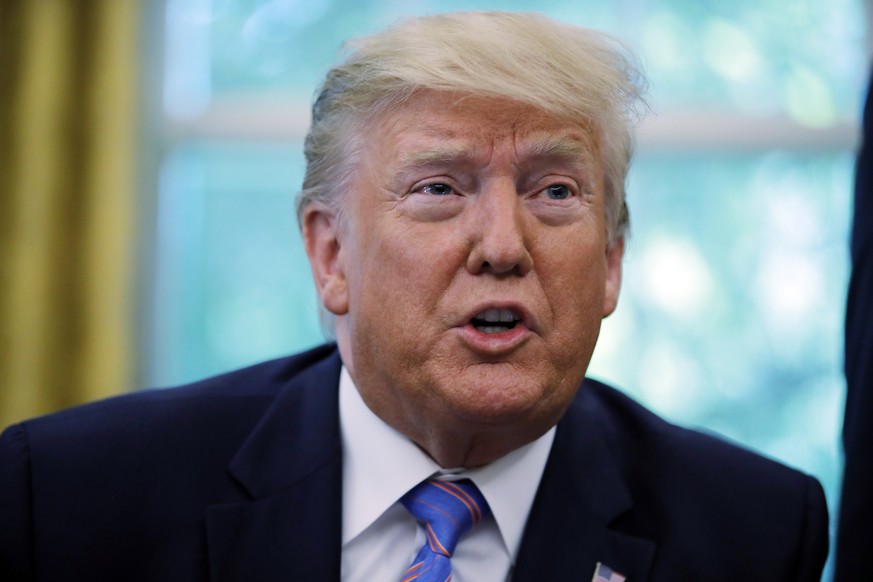 President Donald Trump talks during a signing ceremony in the Oval Office of the White House in Washington, Monday, July 1, 2019, with Vice President Mike Pence, left, and Secretary of Health and Huma ...