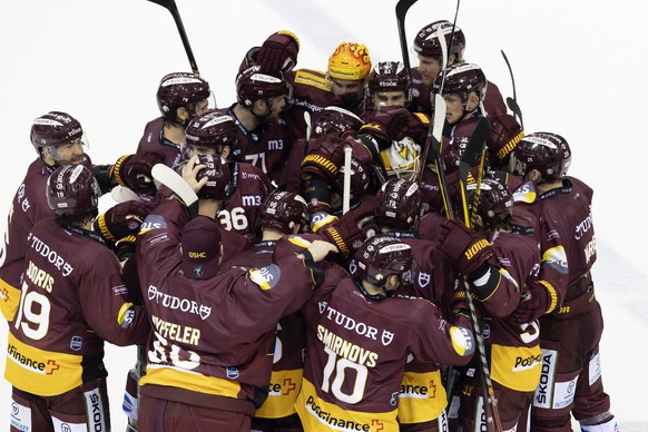 Geneve-Servette&#039;s players celebrate after defeating Lausanne team during the shootout session, at the National League regular season game of the Swiss Championship between Geneve-Servette HC and  ...