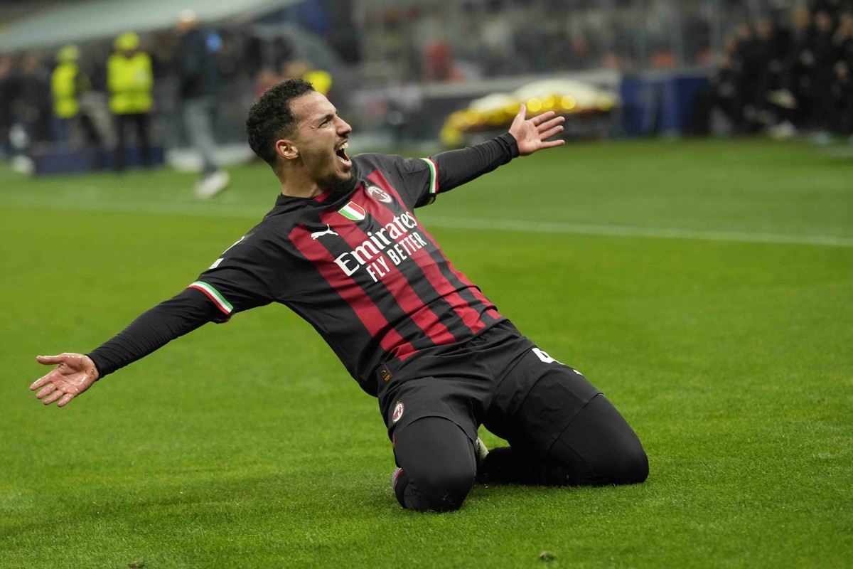 AC Milan's Ismael Bennacer celebrates after scoring his side's opening goal during the Champions League quarterfinal, first leg, soccer match between AC Milan and Napoli, at the San Siro sta ...