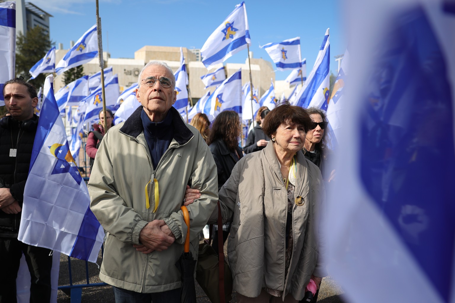epa11909138 People gather at Hostages Square ahead of the release of the bodies of four Israeli hostages held in Gaza, in Tel Aviv, Israel, 20 February 2025. Hamas was set to hand over the bodies of f ...