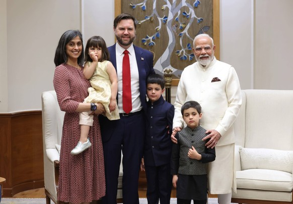 April 21, 2025, New Delhi, India: Indian Prime Minister Narendra Modi, right, poses with U.S Vice President JD Vance, center, and second lady Usha Vance, at Panchavati, April 21, 2025 in New Delhi, In ...