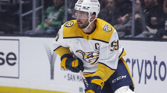 Nashville Predators defensemen Roman Josi moves the puck during the second period of the team&#039;s NHL hockey game against the Los Angeles Kings, Thursday, Feb. 22, 2024, in Los Angeles. (AP Photo/Y ...