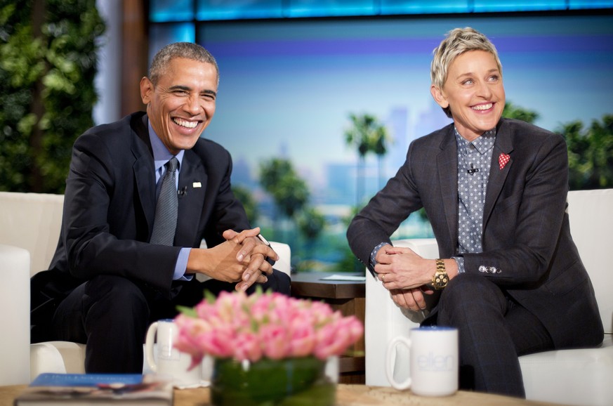 FILE - President Barack Obama talks with Ellen DeGeneres during a commercial break while taping a show segment of the Ellen DeGeneres Show in Burbank, Calif., on Feb. 11, 2016. DeGeneres is taking her ...