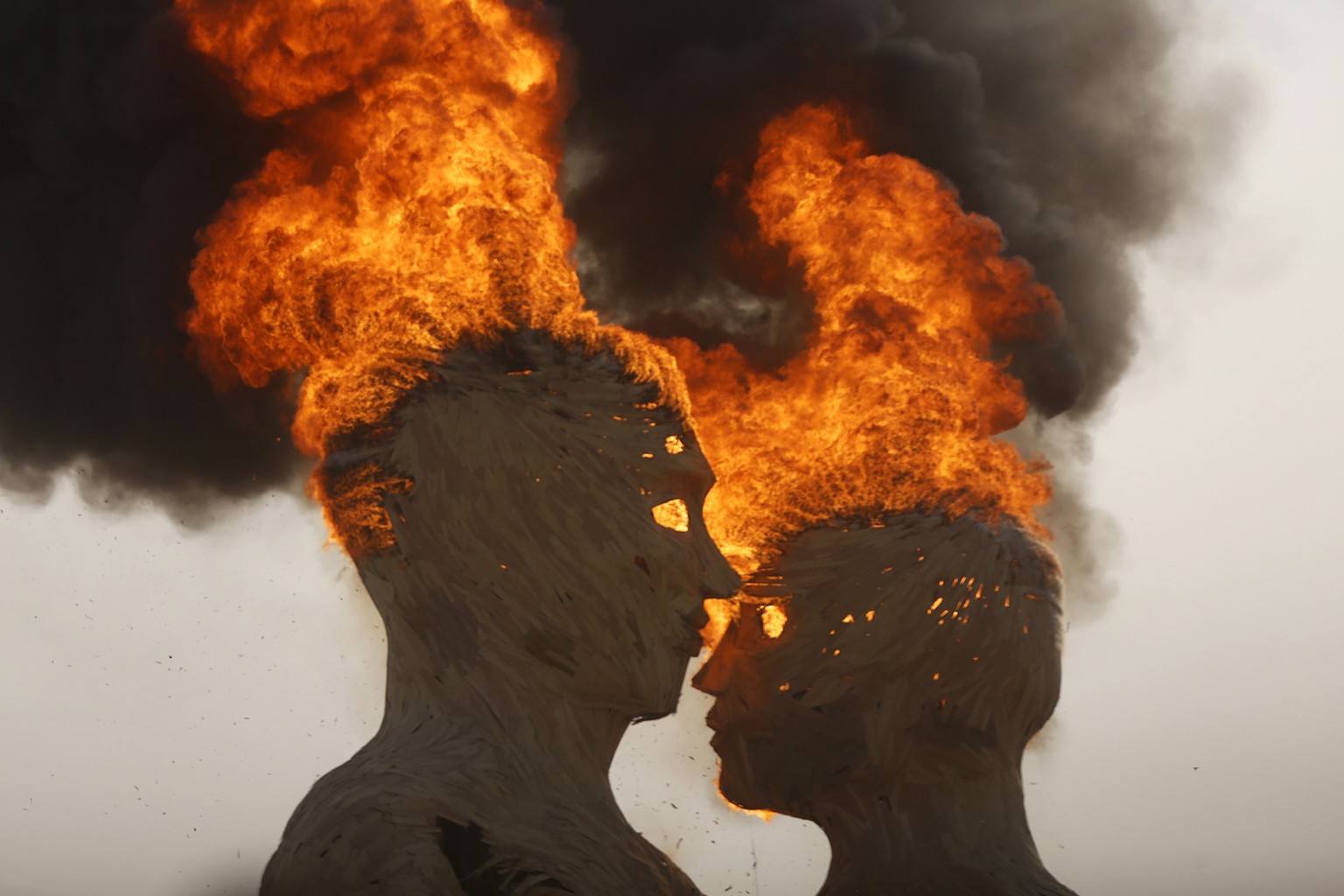 The art installation Embrace burns during the Burning Man 2014 &quot;Caravansary&quot; arts and music festival in the Black Rock Desert of Nevada, August 29, 2014. People from all over the world have  ...