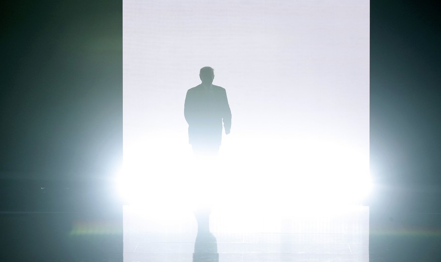 Republican U.S. presidential candidate Donald Trump appears onstage in a blaze of lights at the Republican National Convention in Cleveland, Ohio, U.S. July 18, 2016. REUTERS/Mike Segar