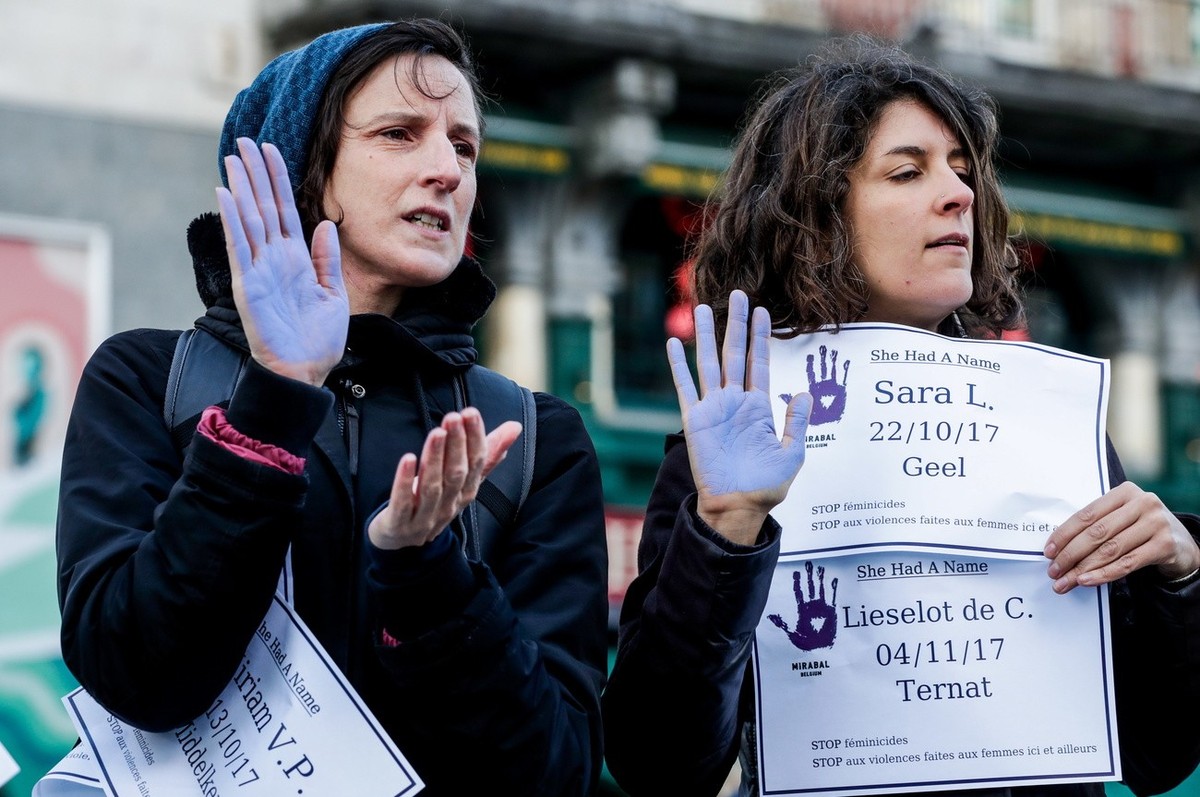 People hold placards with victims names during a demonstration against all kinds of violence towards women, in central in Brussels, Belgium, 25 November 2019. EPA/STEPHANIE LECOCQ