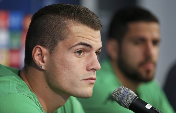 Borussia Moenchengladbach&#039;s Granit Xhaka (L) and Alvaro Dominguez address a news conference on the eve of their Champions League Group D soccer match against Manchester City in Moenchengladbach,  ...