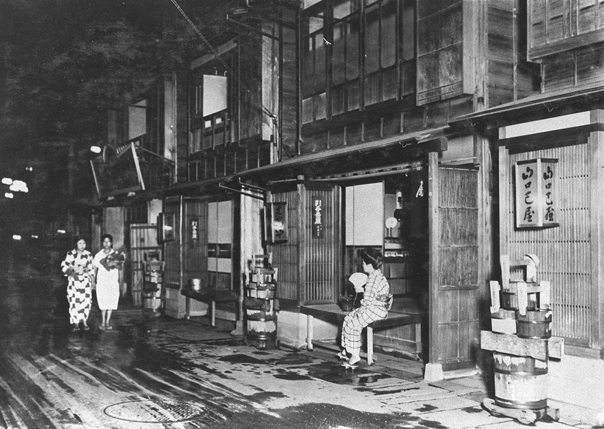 TOKYO, Japan - The file photo shows teahouses in Yoshiwara, which was Japan's largest licensed red-light district until prostitution was banned in 1957, located in Tokyo. The undated photo was ta ...