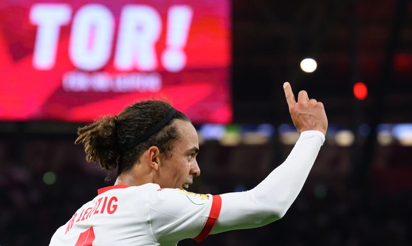 29.10.2024, Sachsen, Leipzig: Fu�ball: DFB-Pokal, RB Leipzig - FC St. Pauli, 2. Runde, Red Bull Arena. Leipzigs Yussuf Poulsen jubelt nach seinem Tor zum 3:1. Foto: Hendrik Schmidt/dpa - WICHTIGER HIN ...